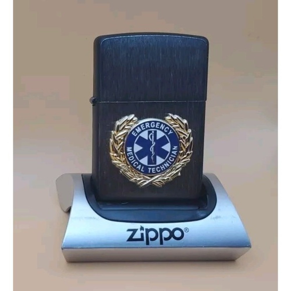 Zippo Lighter With An E.M.T Medallion Silver And Black 2012